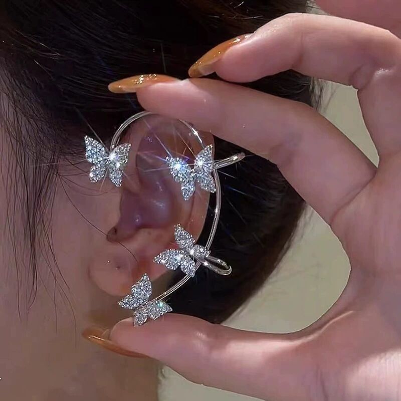 Manchette d'oreille en strass en forme de papillon