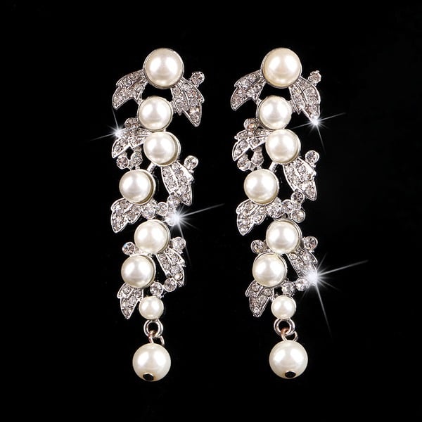 Boucles d'oreilles luxueuses en zircone cubique/perle