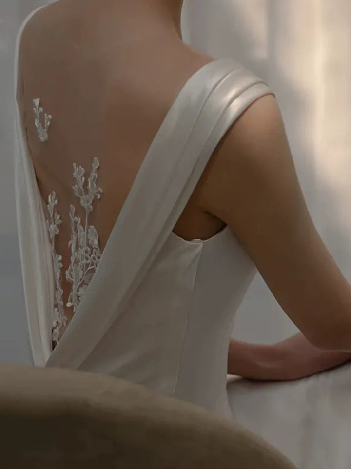 Robe De Mariée Forme Trompette/Sirène, Col Rond Creux, Sans Manches, Traîne Légère, Avec Appliques En Tulle