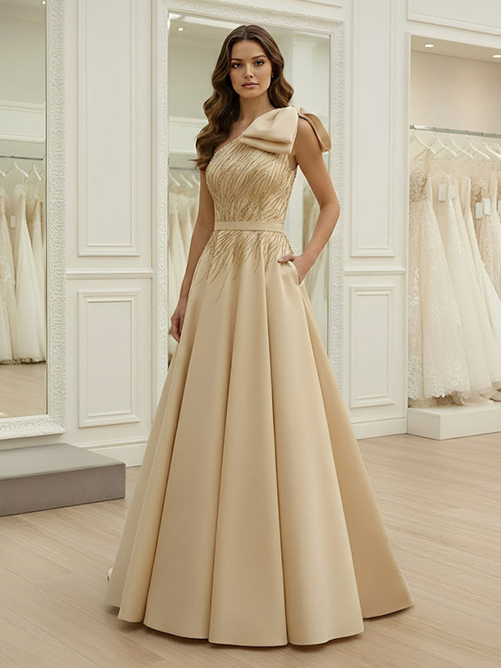 Robe soirée ligne A une épaule satin nœud sans manches sequins, longueur sol