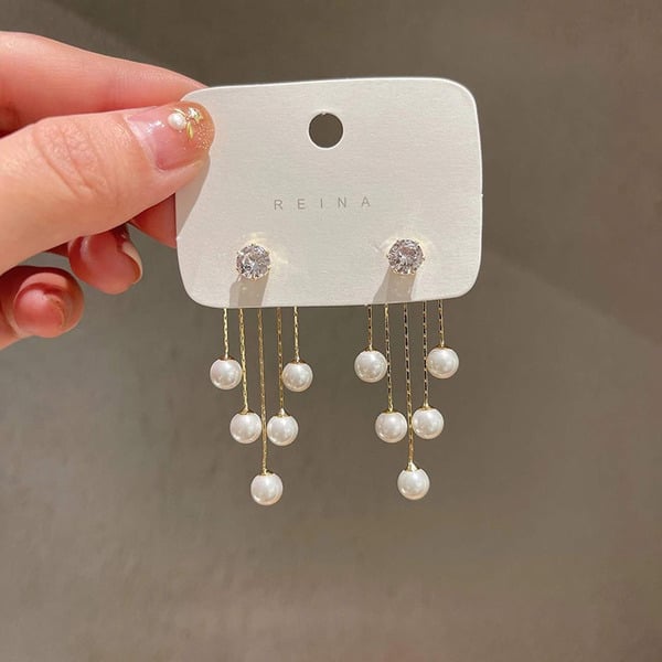 Boucles d'oreilles pendantes avec perles