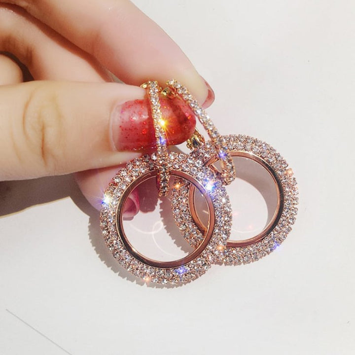 Boucles d'oreilles créoles en strass brillant